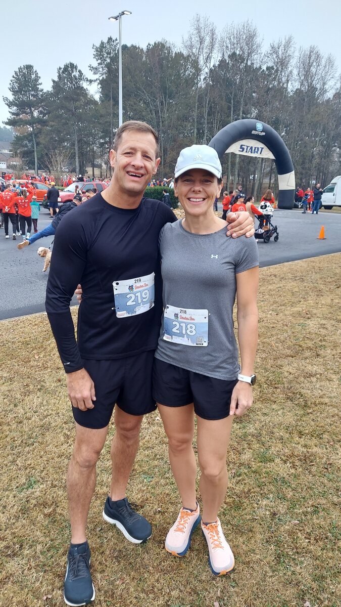 Merrill and Emily Burrows together at a road race